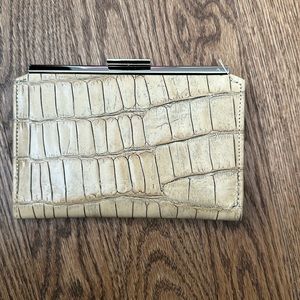 Abas slim wallet, tan leather with matching nylon interior.